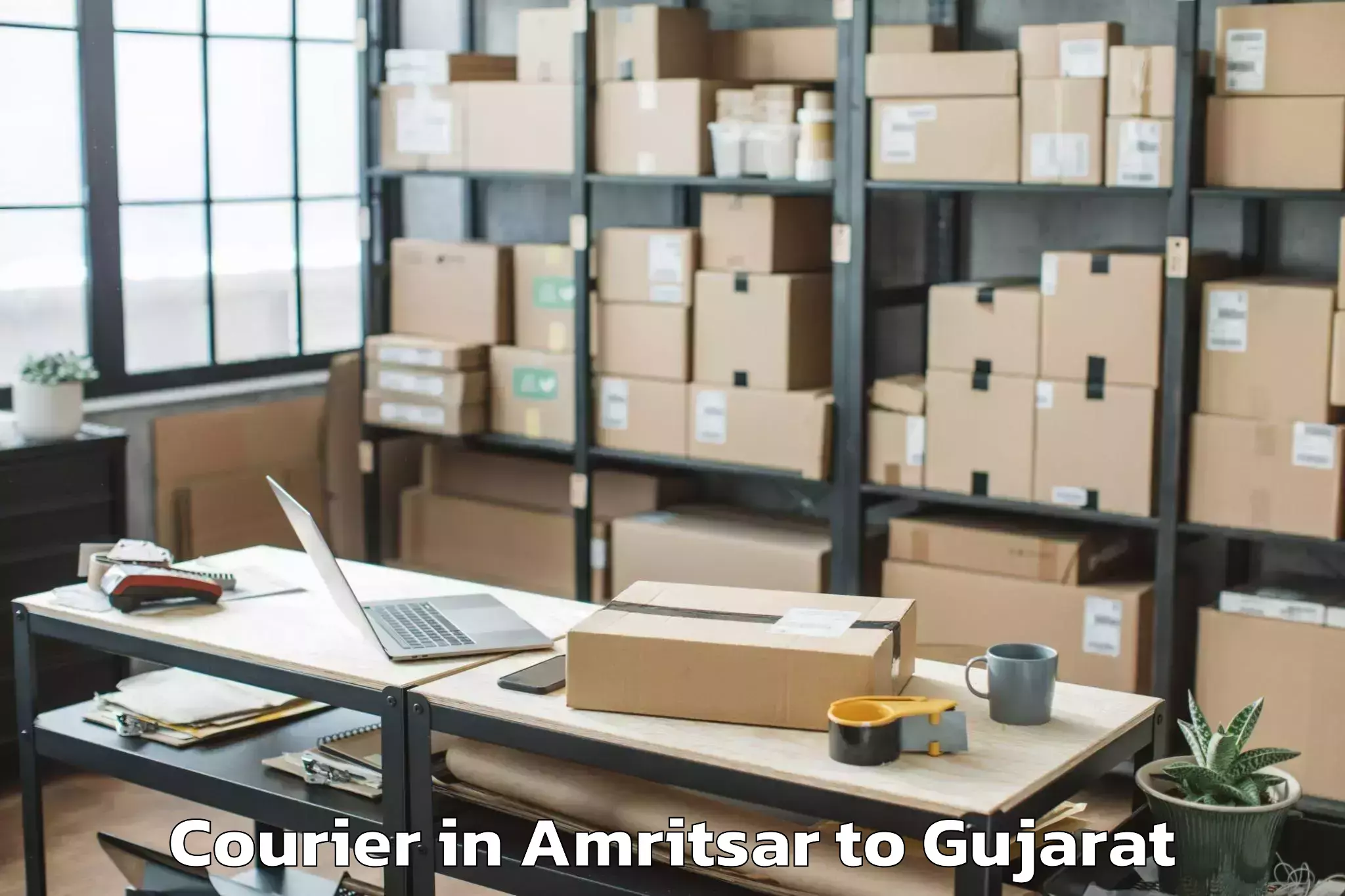 Top Amritsar to Gadhada Courier Available